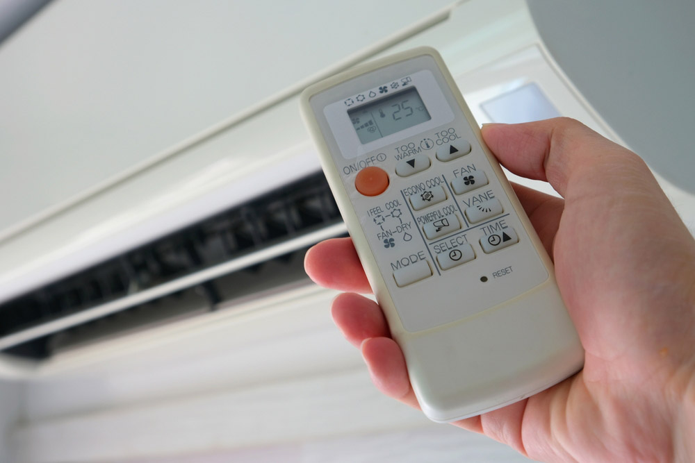 homeowner turning on AC in Baxter, TN homeowner turning on AC in Baxter, TN
