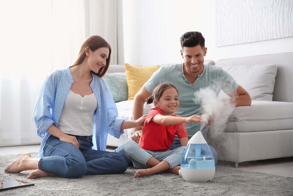 Family near air humidifier at home Monterey, TN Family near air humidifier at home Monterey, TN